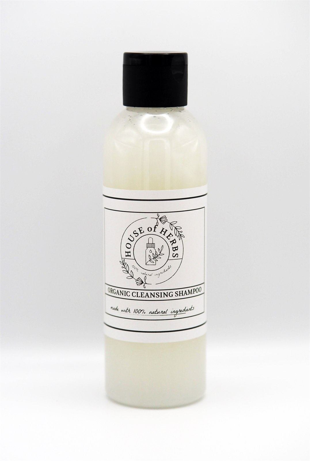 House of Herbs clarifying shampoo on a clean premium backdrop.