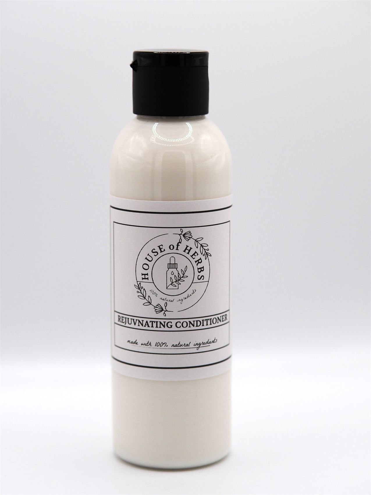 House of Herbs Hair Conditioner bottle on a white studio background.