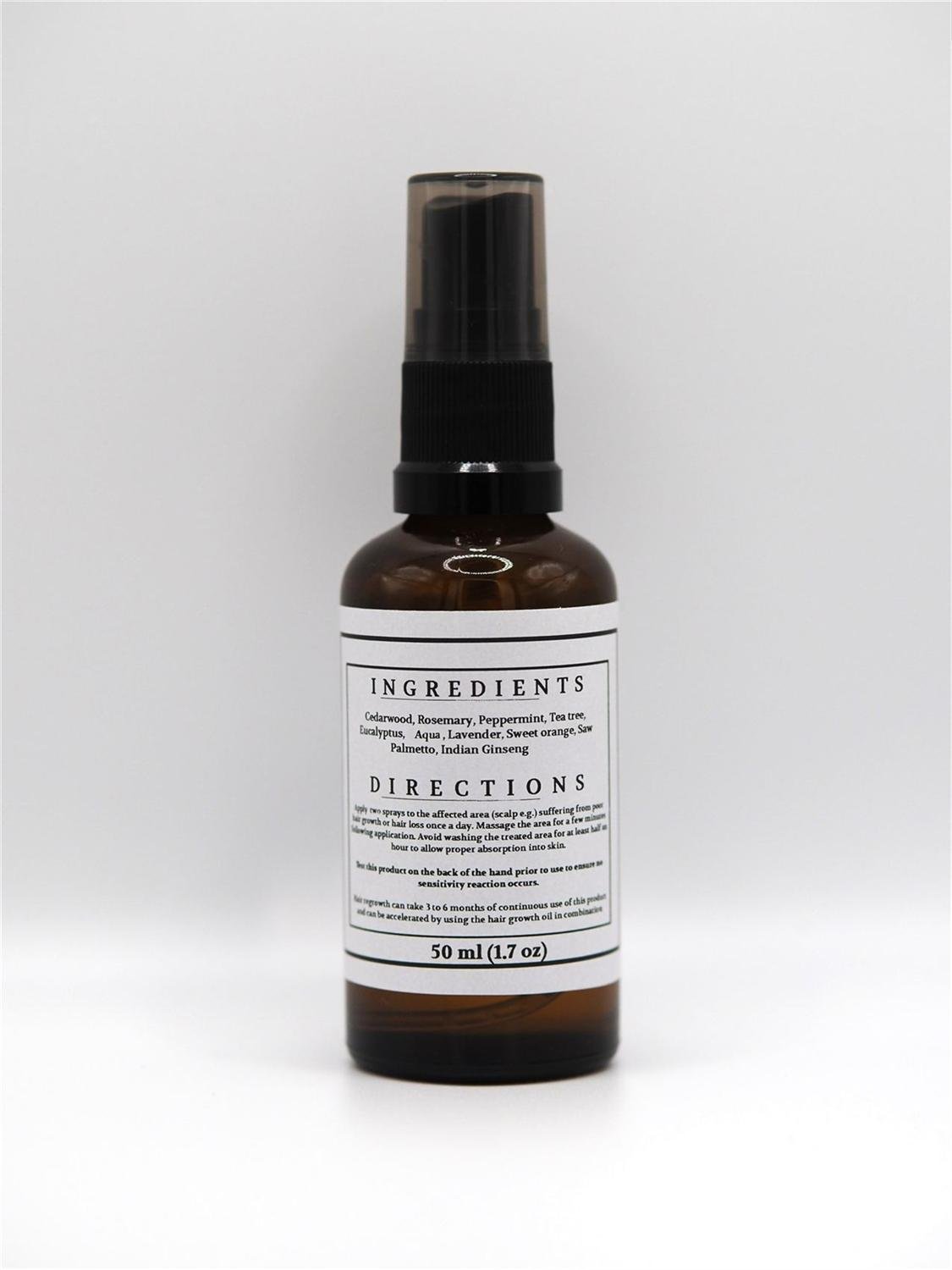 House of Herbs Hair Growth Spray bottle shown closer with label details visible.